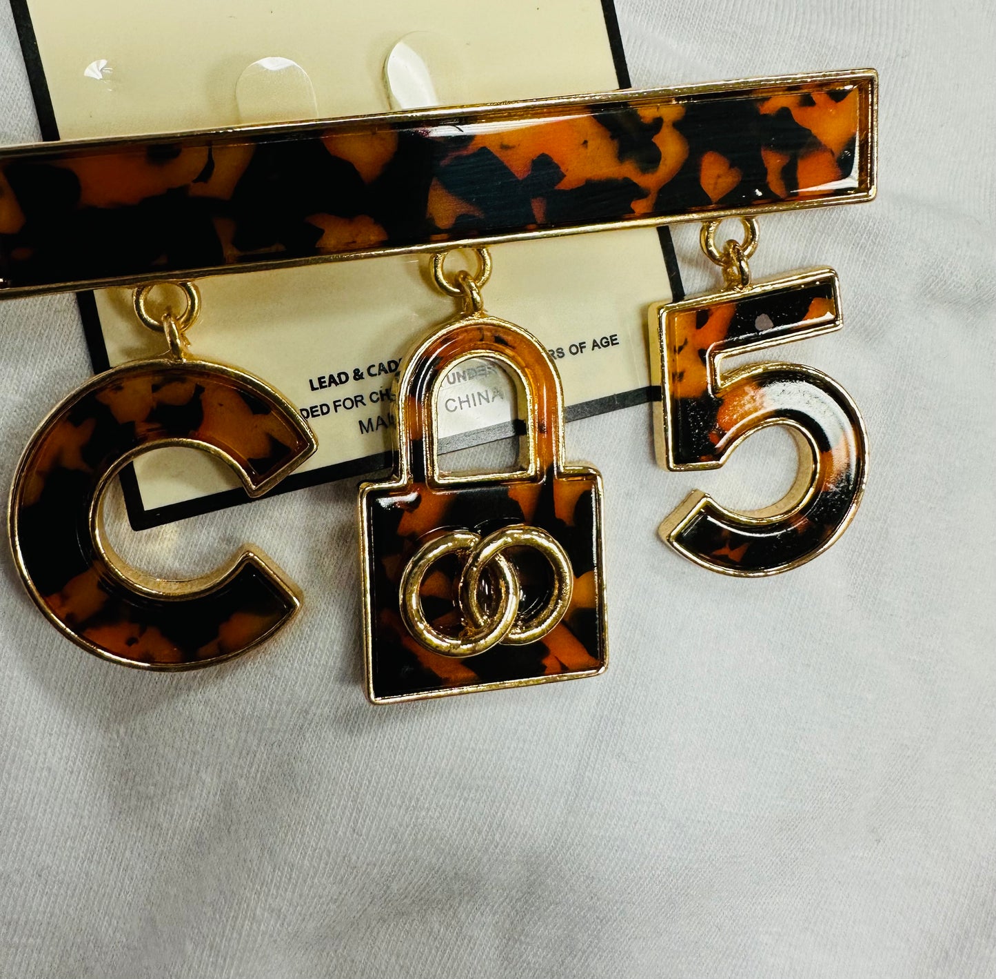 C PURSE 5 TORTOISE BROOCH