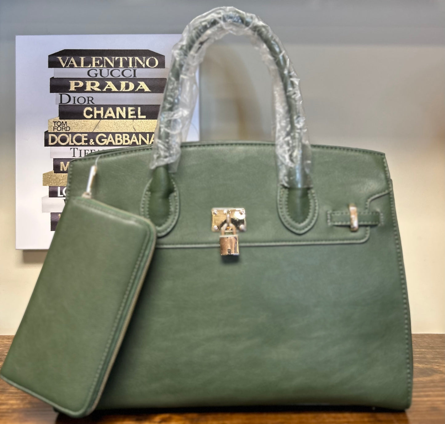 LEATHER LOCK HANDBAG
