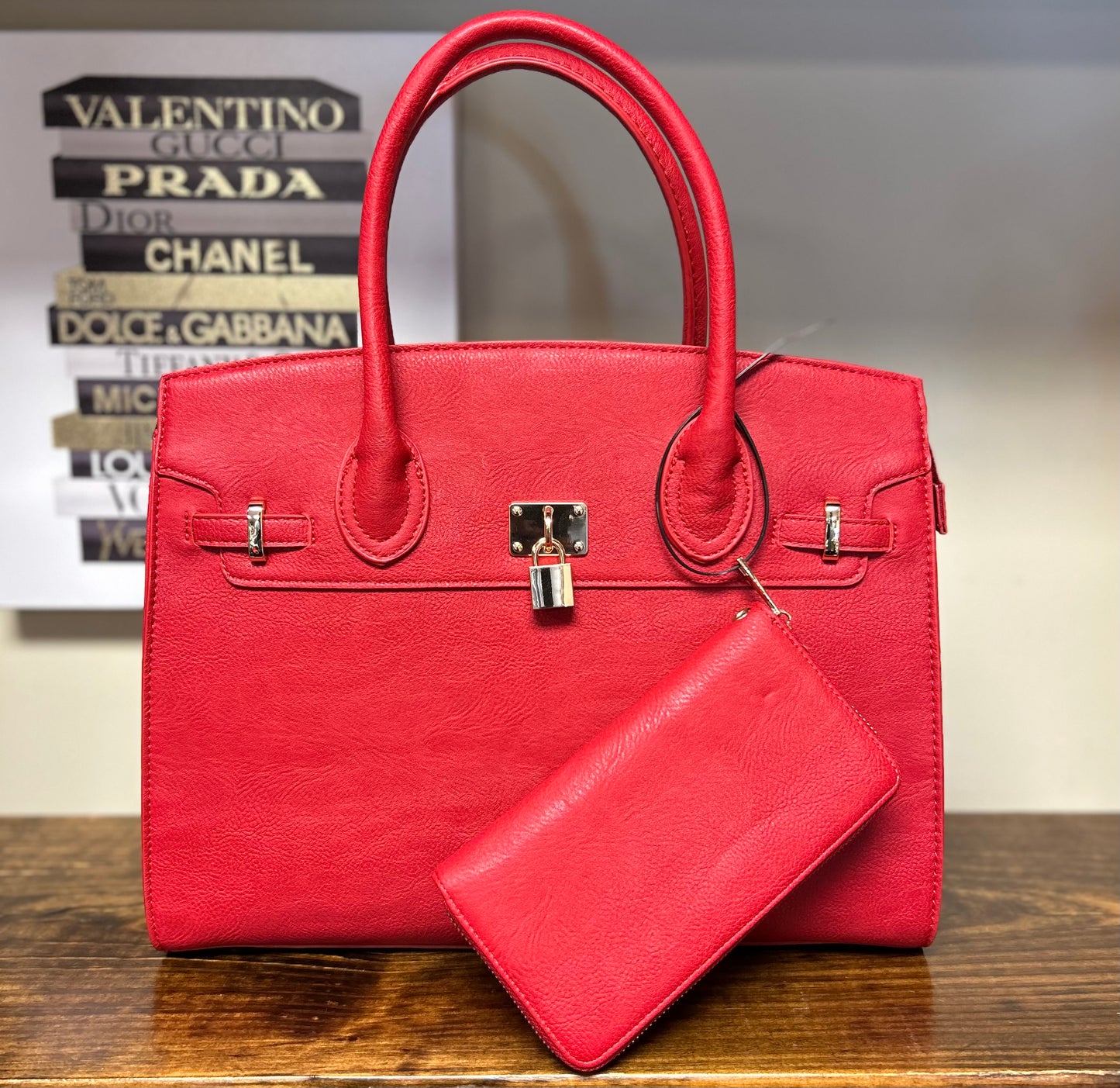 LEATHER LOCK HANDBAG